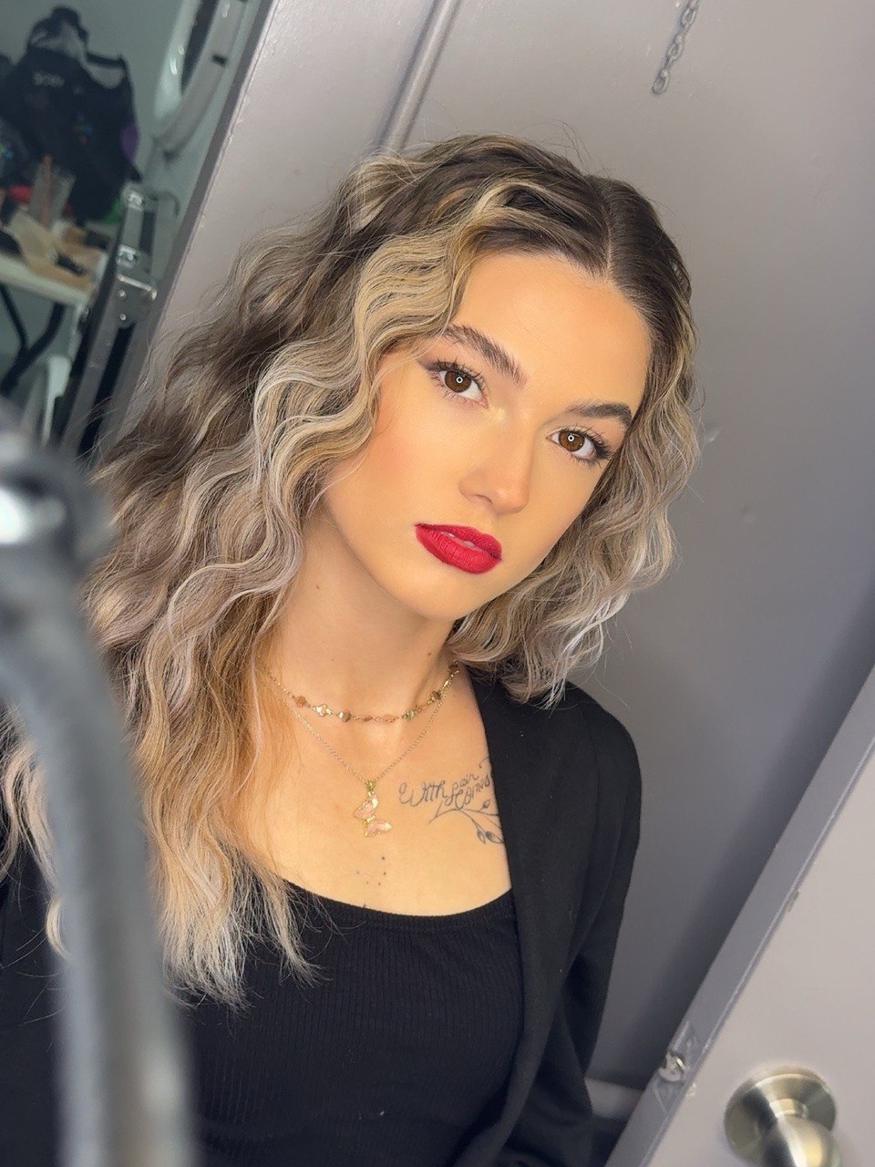 Signature glam — sculpted eye, red lip, glossy skin